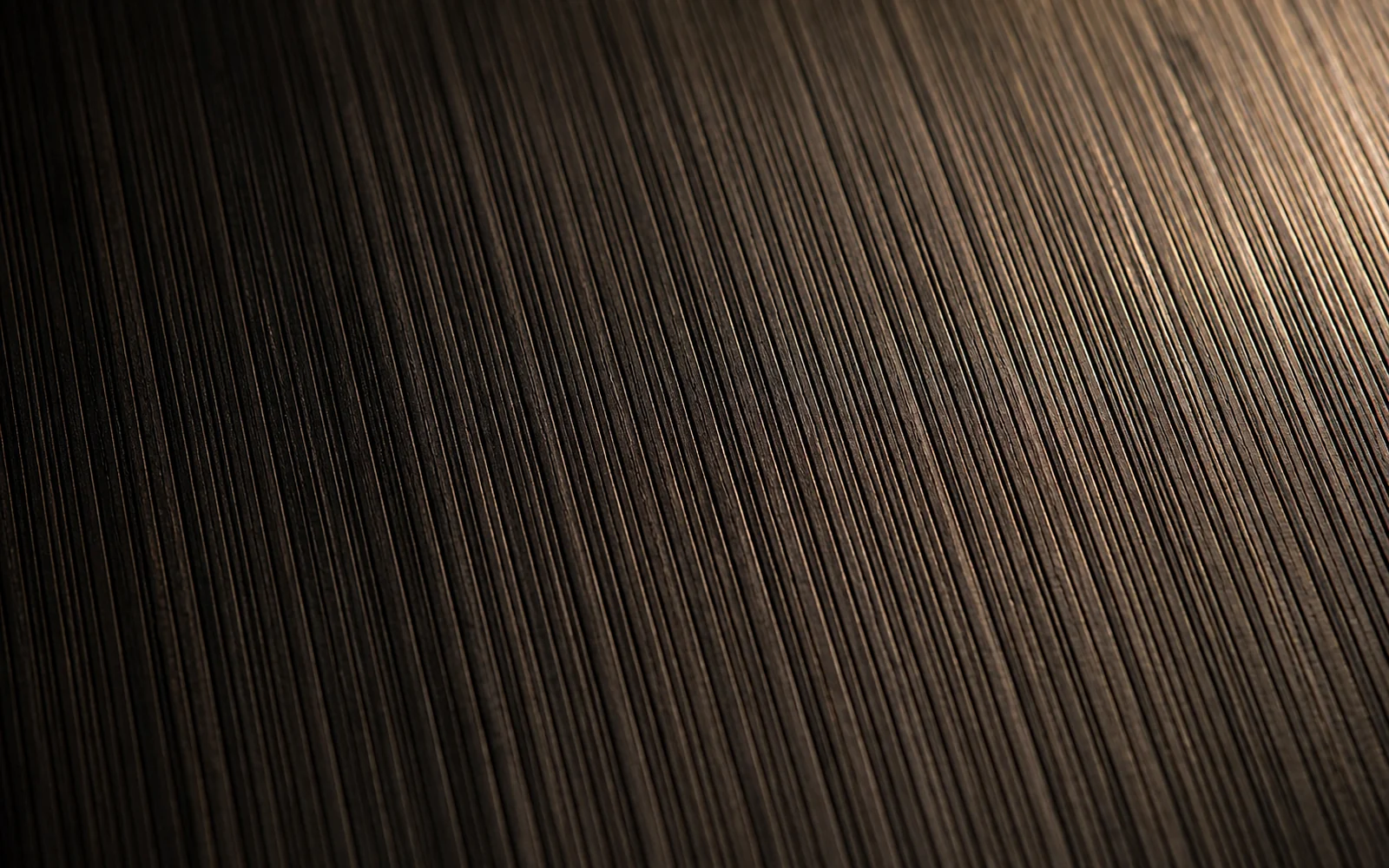 Dark fineline technical wood with dense parallel grooves
